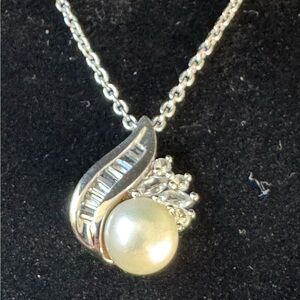 Elegant Sterling Silver Pearl and White sapphire Pendant Necklace.